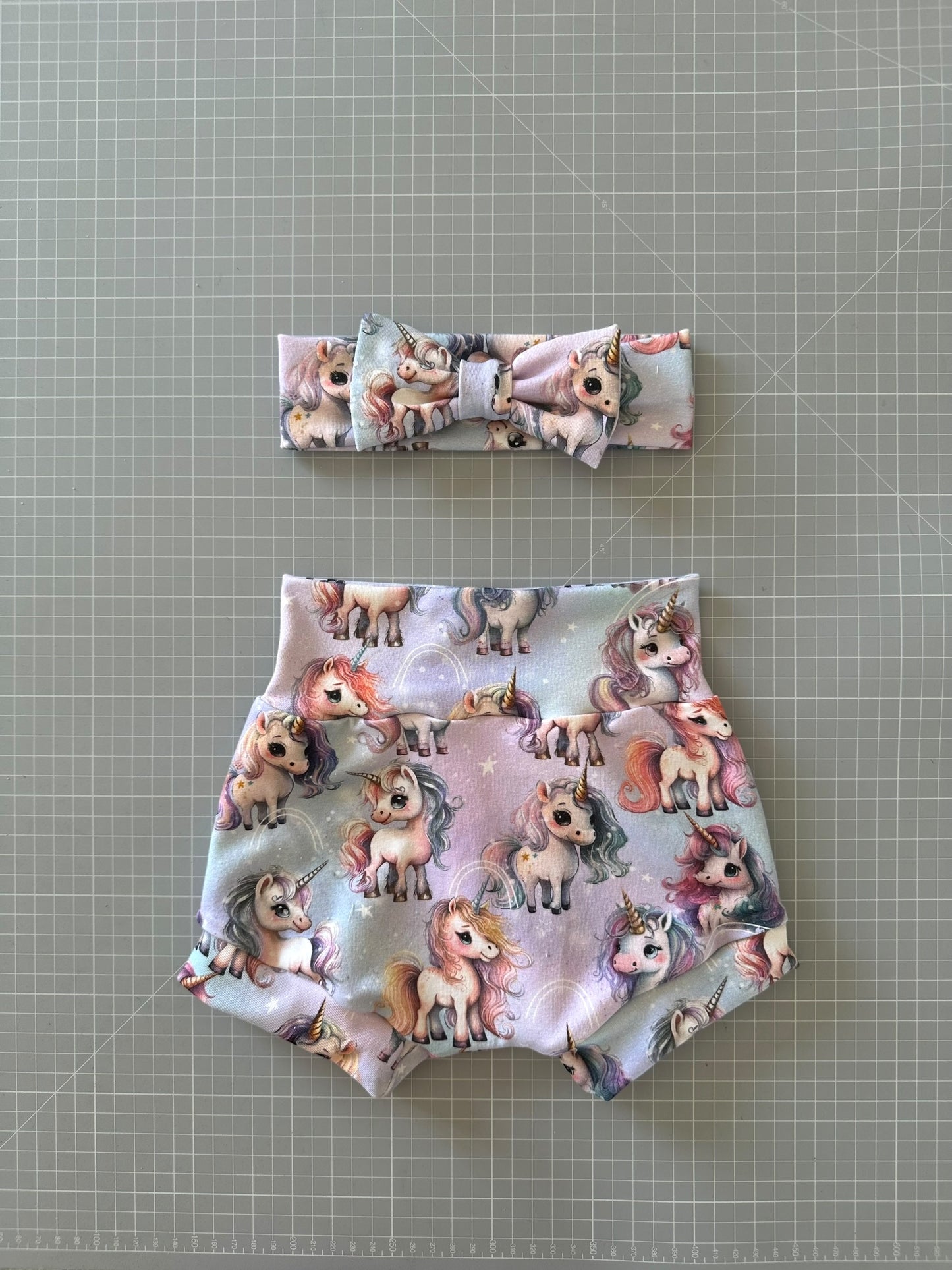 Completo pantaloncino e fascia capelli