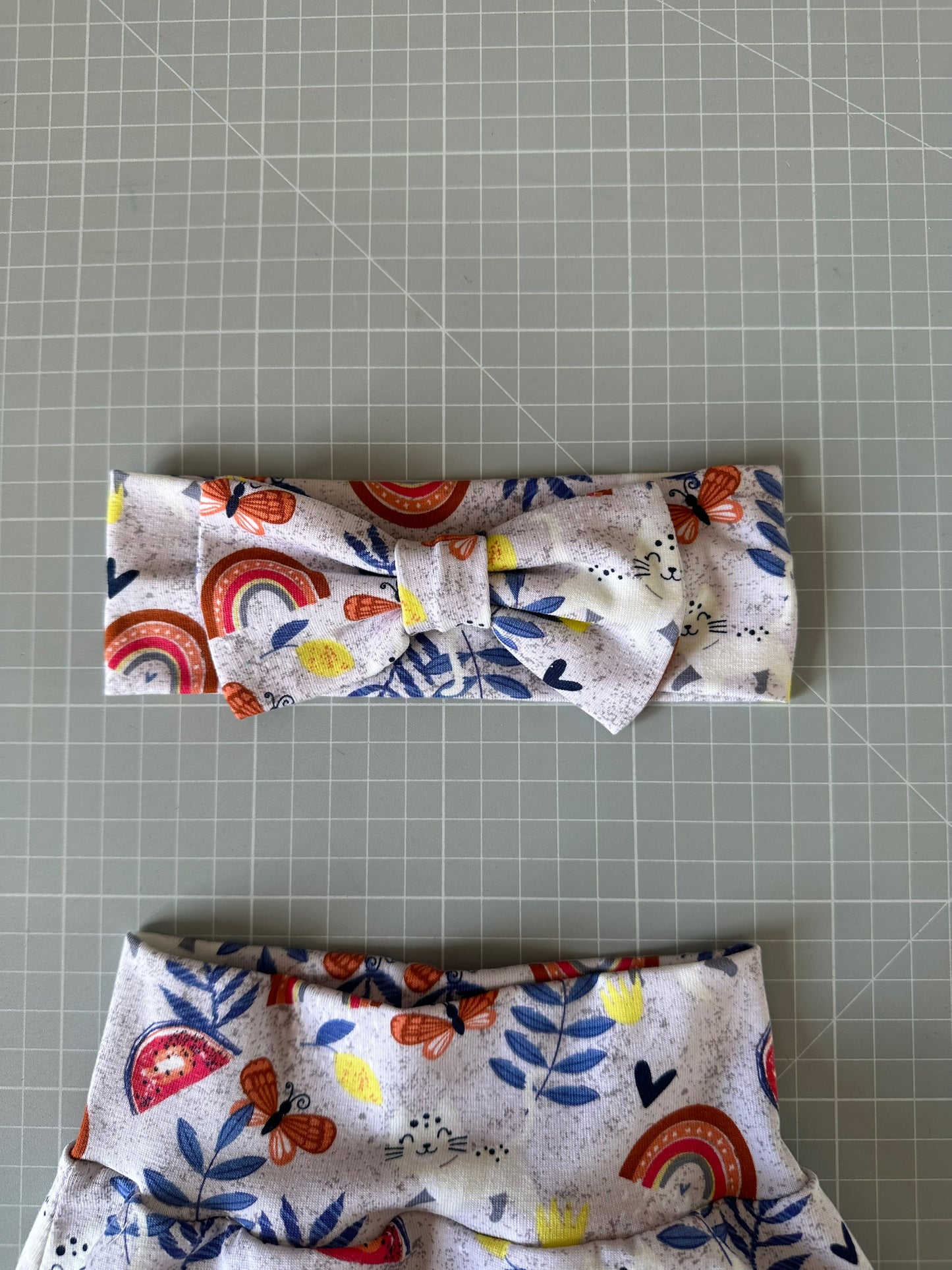 Completo pantaloncino e fascia capelli