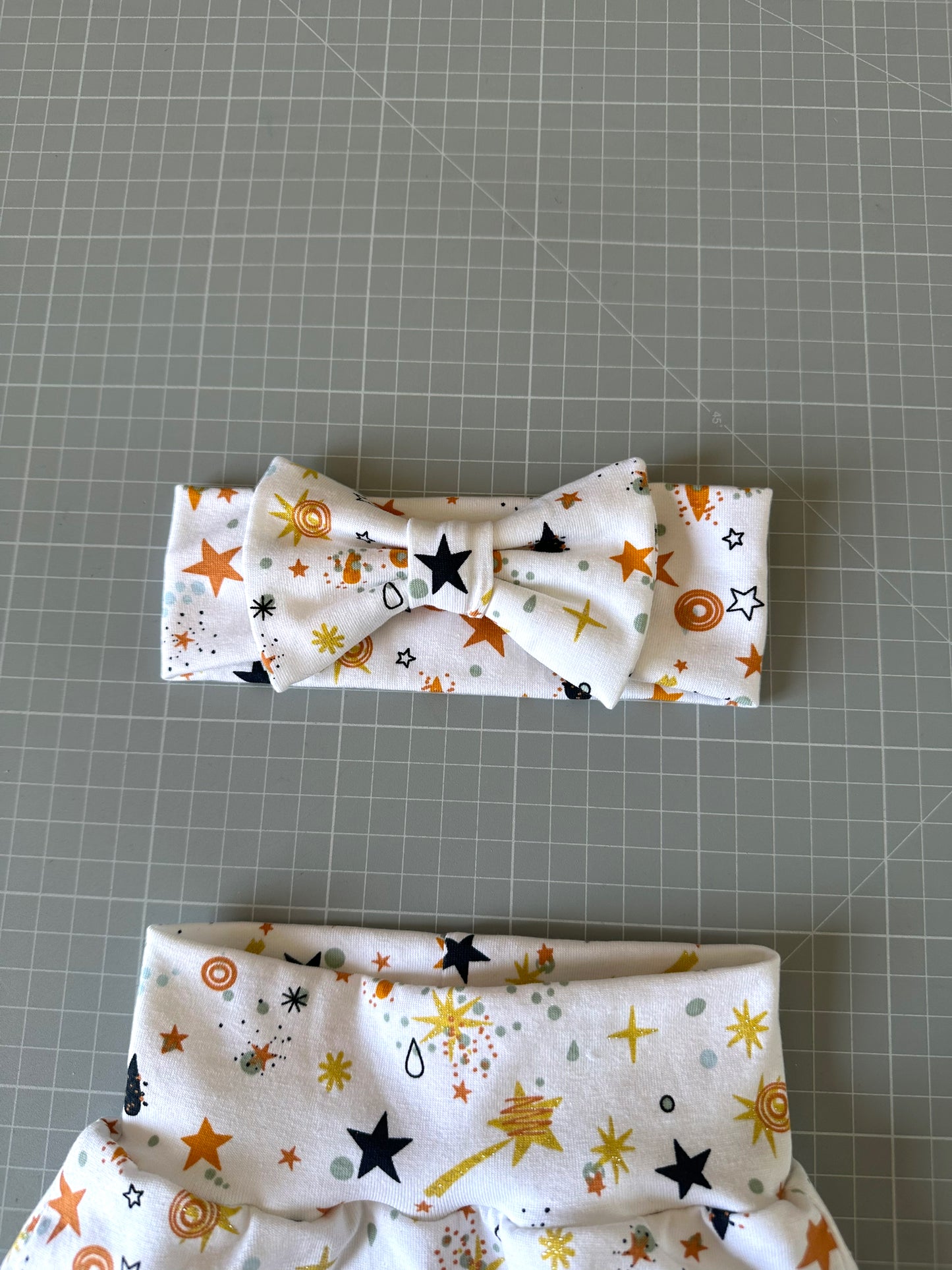 Completo pantaloncino e fascia capelli