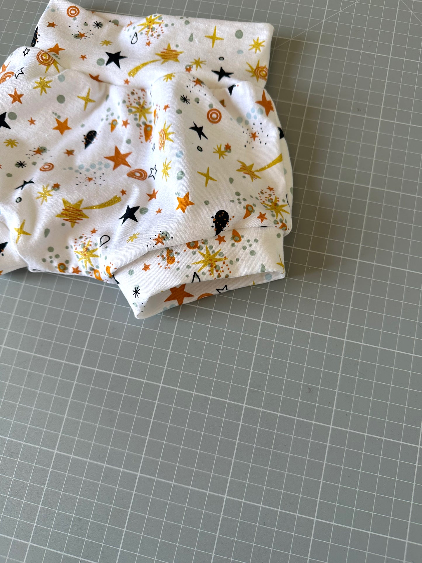Completo pantaloncino e fascia capelli