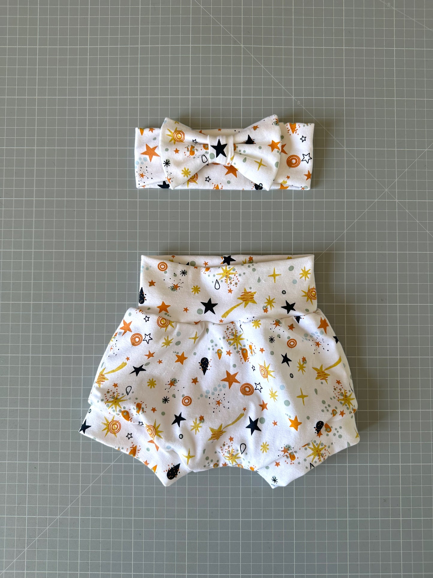 Completo pantaloncino e fascia capelli